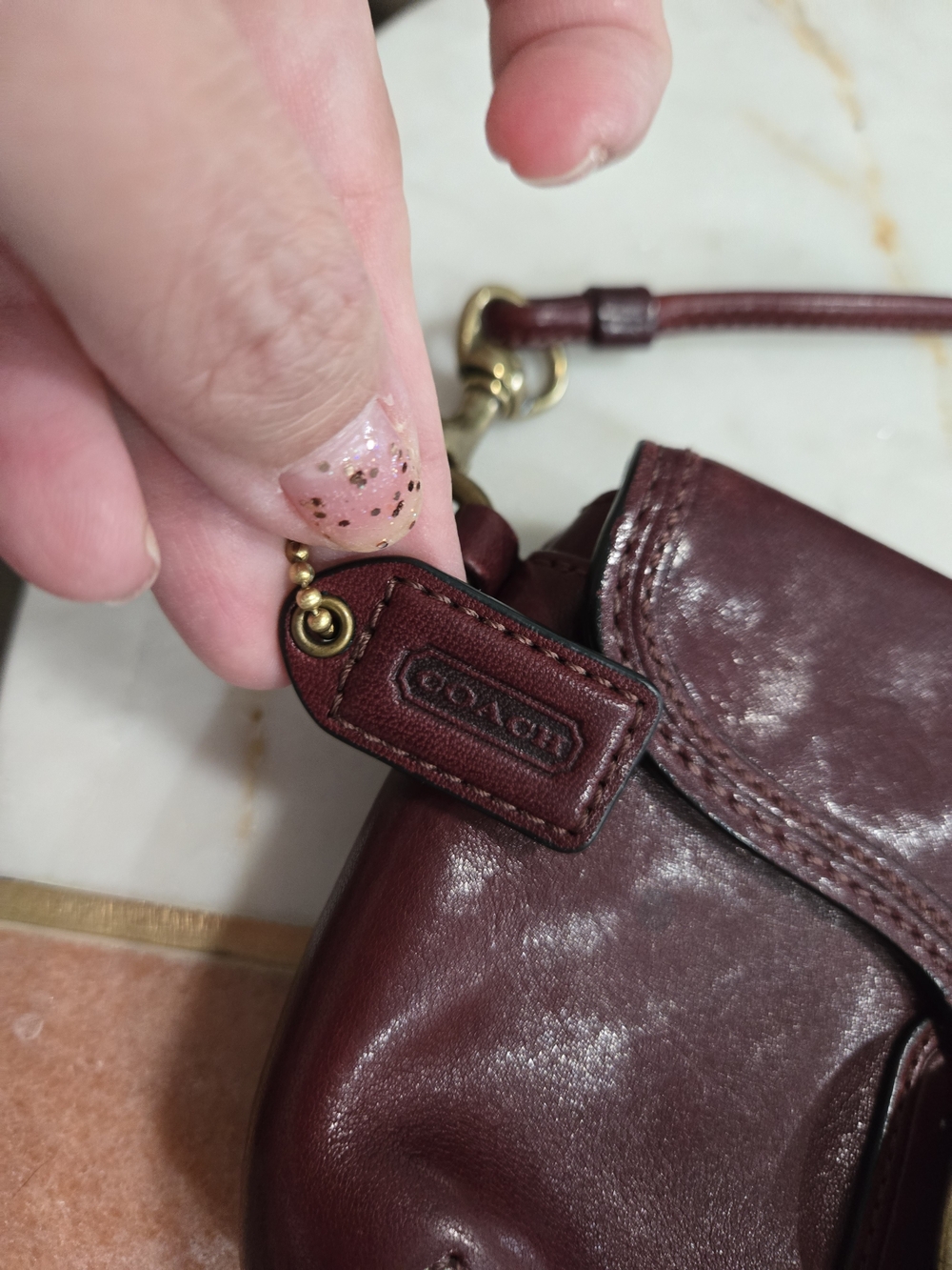 Coach Bleecker Buckle Flap Leather Wristlet in a deep wine/burgundy - Picture 3 of 8